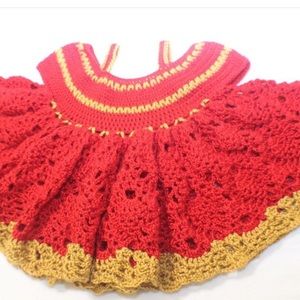 Handmade, crocheted baby dress